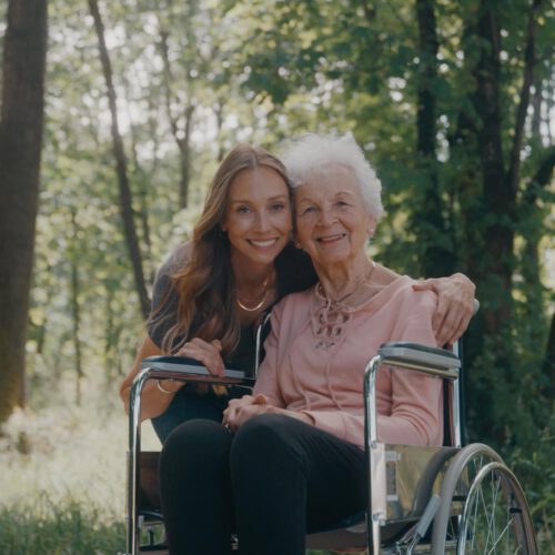 Helping Woman In Wheelchair